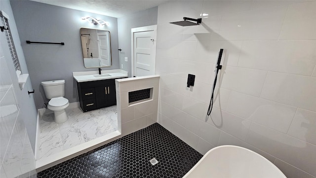 4526 Dixie Dr, Houston, TX 77021 - bathroom featuring vanity, tiled shower, toilet, and marble look tiles