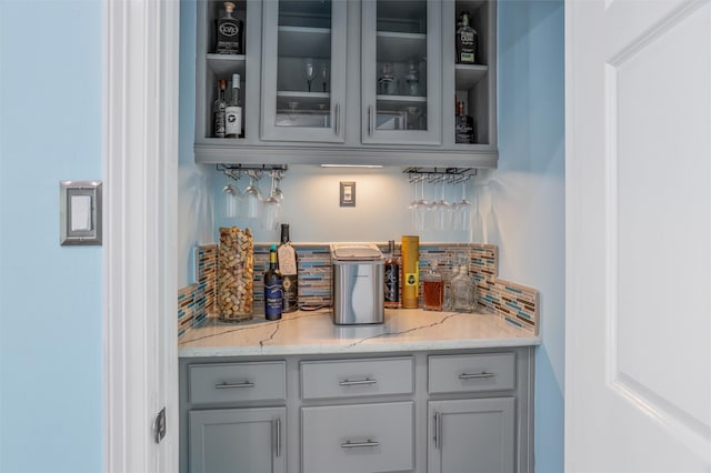 bar with light stone countertops