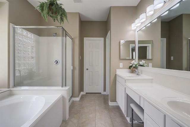 bathroom with vanity, tile patterned flooring, and separate shower and tub