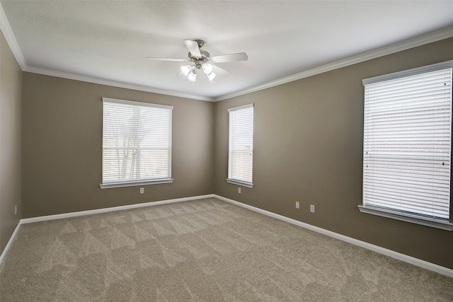 unfurnished room with light carpet, crown molding, and ceiling fan