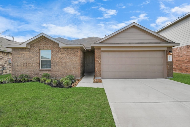 ranch-style home featuring a garage and a front yard