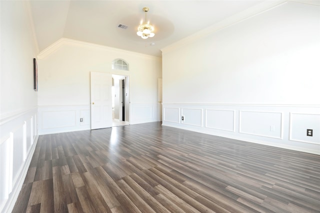 spare room with dark hardwood / wood-style floors, crown molding, vaulted ceiling, and ceiling fan