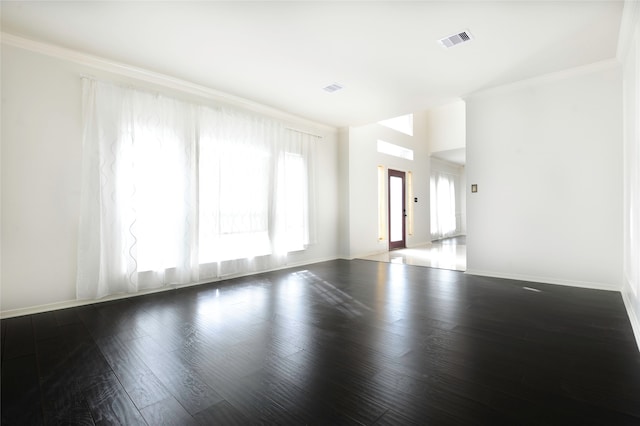 unfurnished room featuring dark hardwood / wood-style flooring and ornamental molding