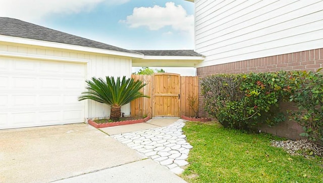 view of yard featuring a garage