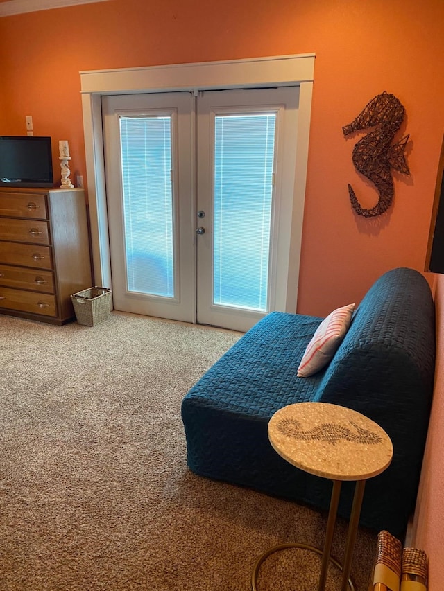 bedroom featuring french doors and carpet floors