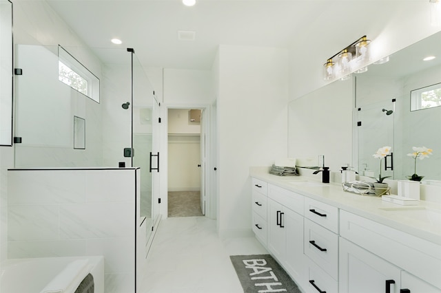 bathroom with vanity and plus walk in shower