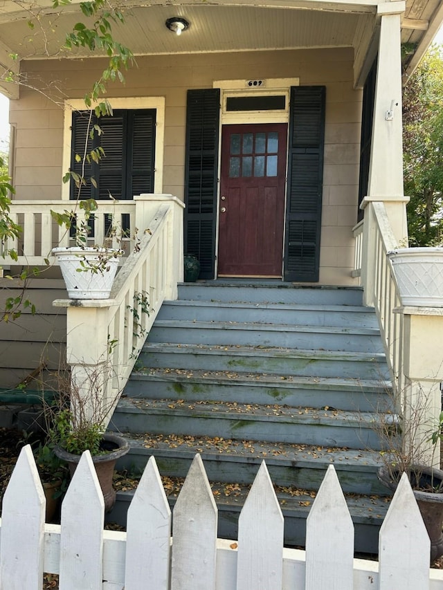 entrance to property with covered porch