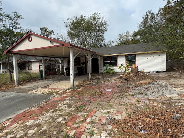 view of front of home with a carport