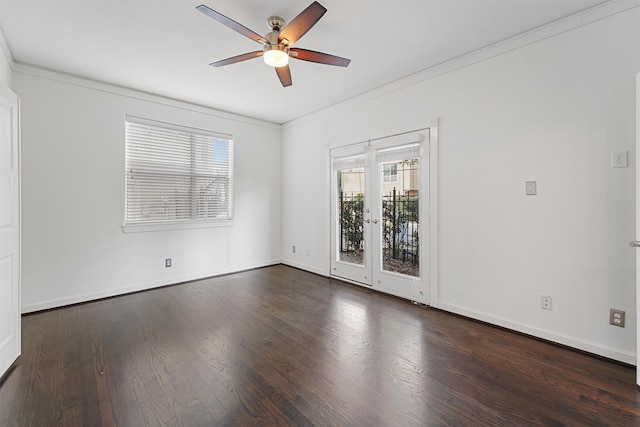 empty room featuring dark hardwood / wood-style flooring, french doors, ceiling fan, and crown molding