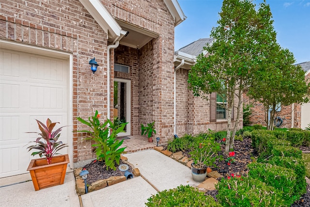 property entrance with a garage