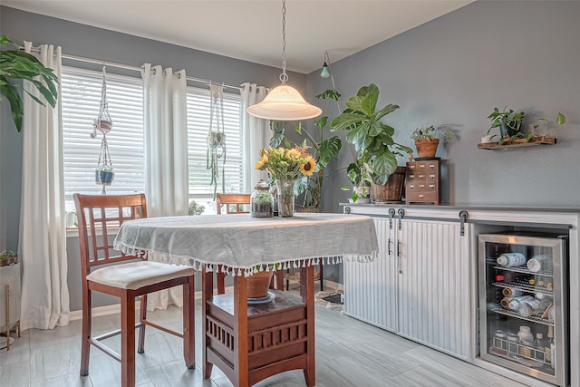 dining area featuring wine cooler