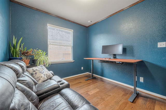 office featuring hardwood / wood-style floors, vaulted ceiling, and crown molding