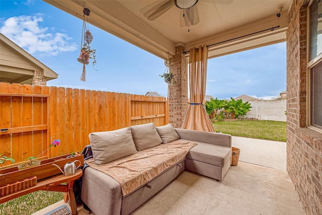 view of patio featuring ceiling fan