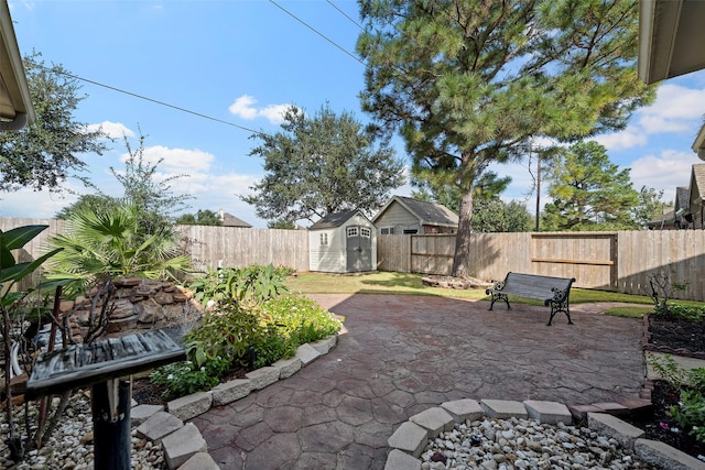 view of patio featuring a shed