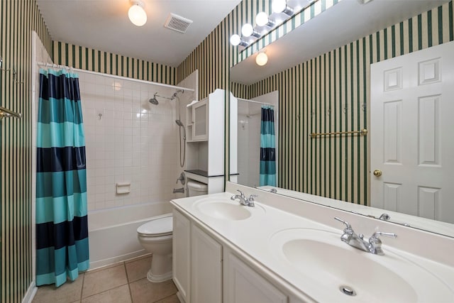 full bathroom with tile patterned flooring, vanity, toilet, and shower / tub combo with curtain