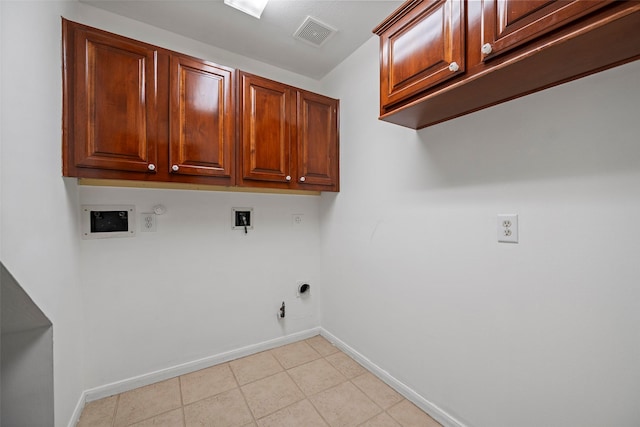 laundry room with cabinets, hookup for an electric dryer, gas dryer hookup, and washer hookup