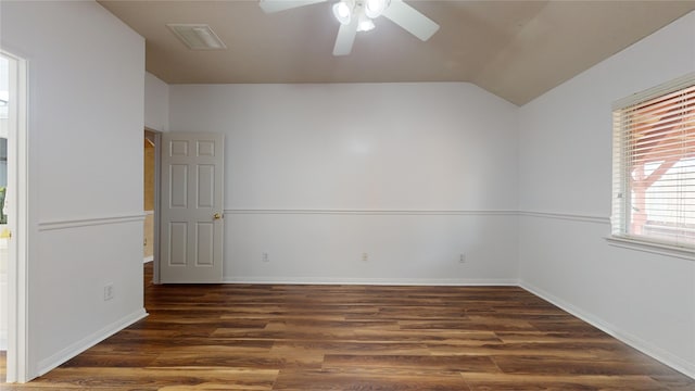 unfurnished room with ceiling fan, dark hardwood / wood-style flooring, and lofted ceiling