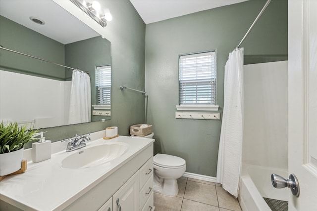 full bathroom with toilet, shower / bath combo, vanity, and tile patterned floors