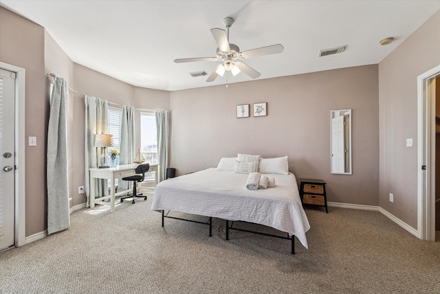 carpeted bedroom featuring ceiling fan