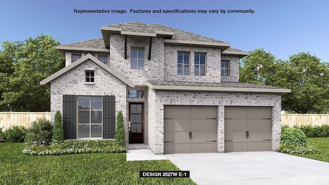 view of front of house with a front lawn and a garage