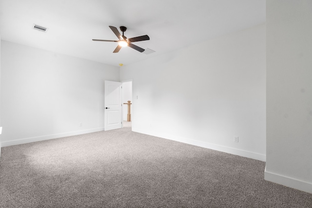 unfurnished room featuring carpet and ceiling fan