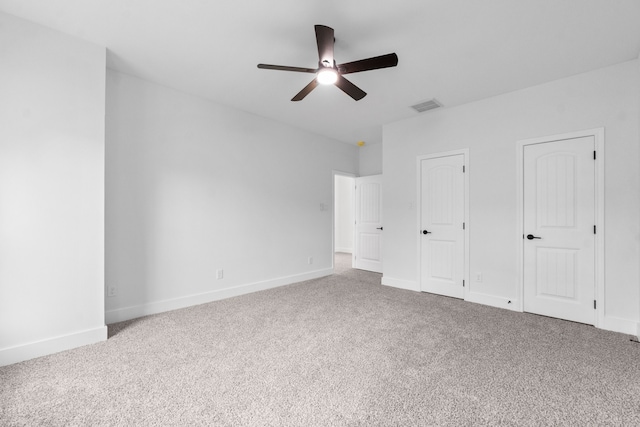 unfurnished bedroom with carpet and ceiling fan