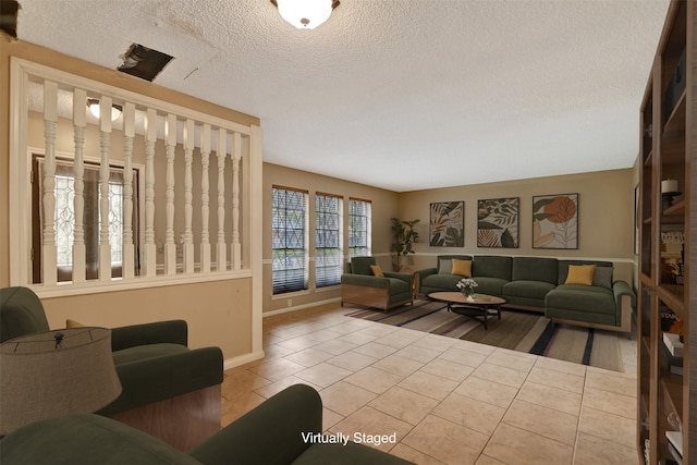 living room with hardwood / wood-style floors and a textured ceiling