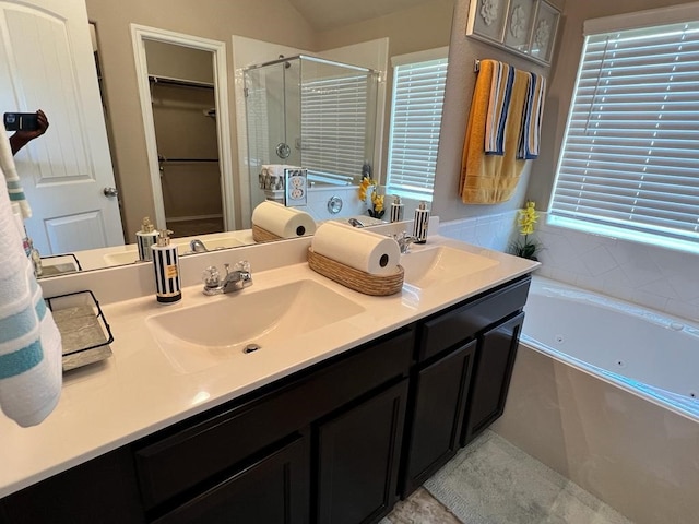 bathroom with vanity and plus walk in shower