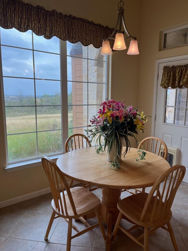 6016 Fm 2720, Maxwell, TX 78656 - dining space featuring baseboards and plenty of natural light