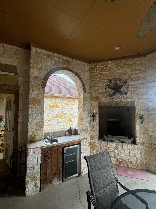6016 Fm 2720, Maxwell, TX 78656 - view of patio with wine cooler, an outdoor kitchen, and a sink
