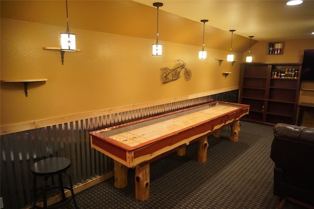 playroom featuring carpet floors and lofted ceiling