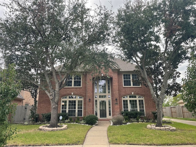 view of front facade with a front lawn