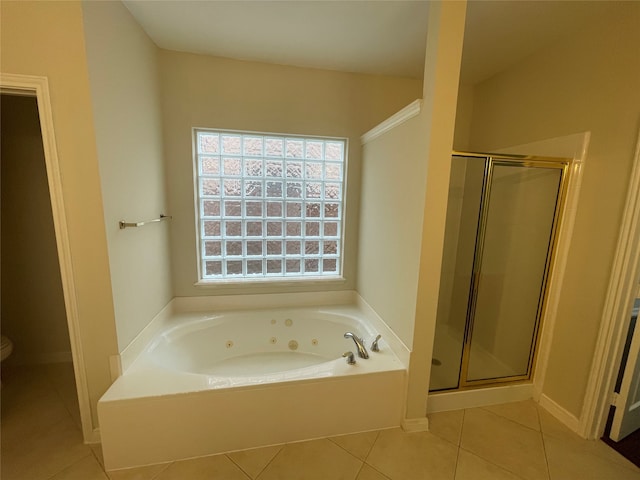 bathroom featuring shower with separate bathtub and tile patterned floors