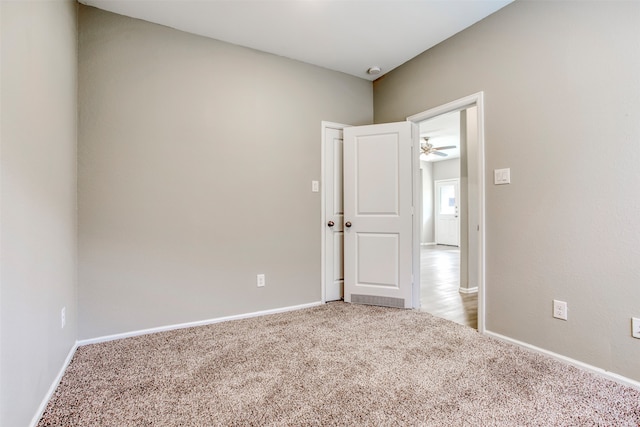 spare room featuring carpet floors