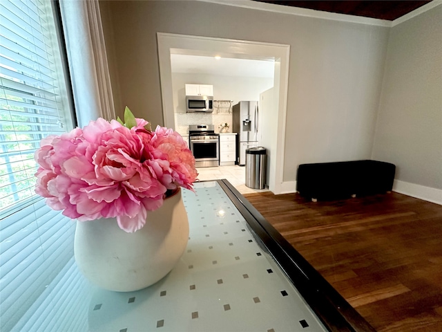 interior space featuring ornamental molding