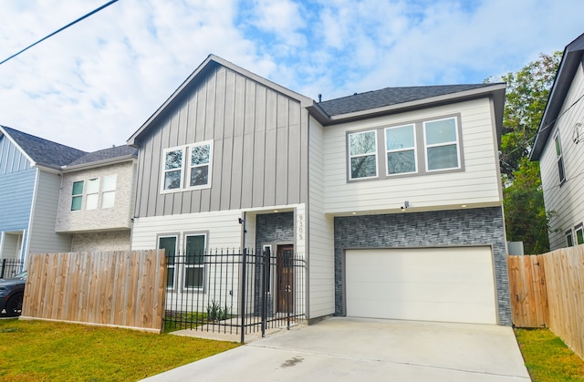 view of front of home with a garage