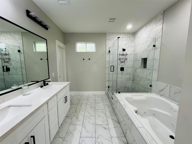 bathroom with vanity, a wealth of natural light, and separate shower and tub