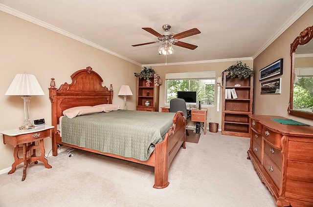 bedroom with ceiling fan, ornamental molding, and light colored carpet