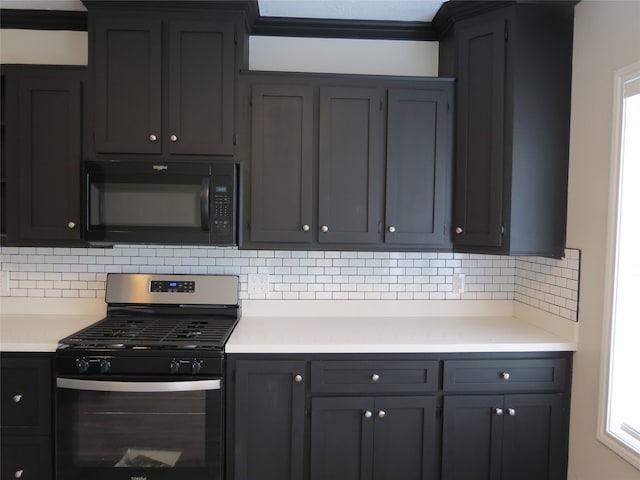 kitchen with crown molding, tasteful backsplash, and stainless steel range with gas cooktop