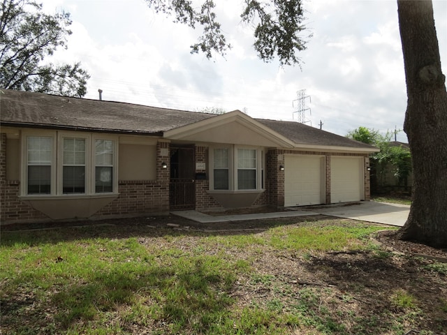 single story home featuring a garage