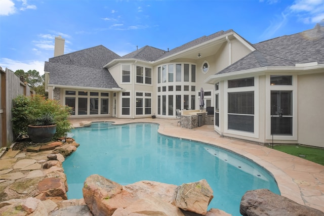 view of swimming pool featuring a patio