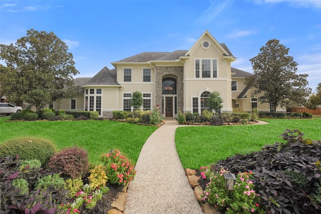 view of front of property with a front lawn