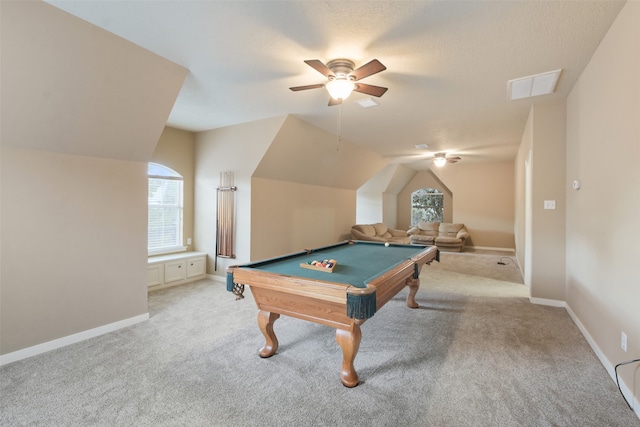 recreation room with billiards, a wealth of natural light, lofted ceiling, and light colored carpet