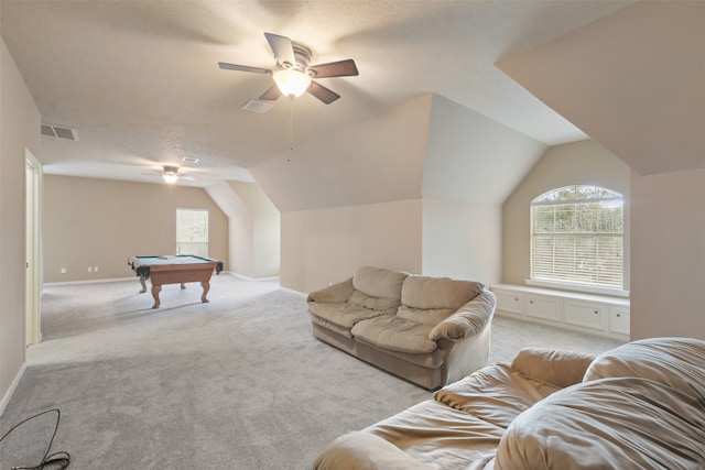 game room with light colored carpet, a textured ceiling, pool table, and vaulted ceiling