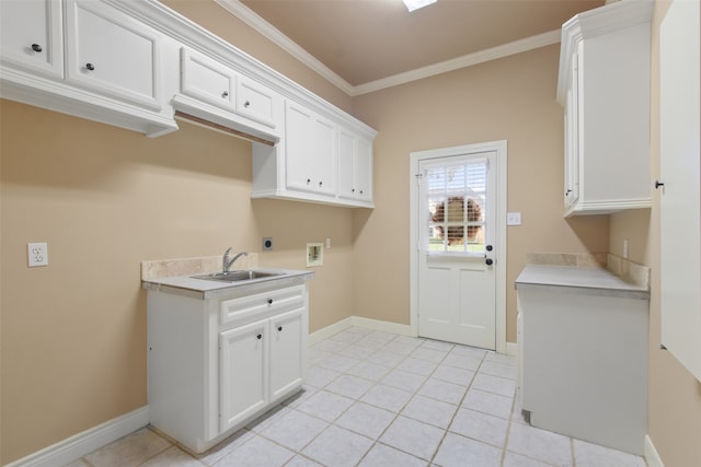 clothes washing area featuring cabinets, sink, ornamental molding, hookup for an electric dryer, and hookup for a washing machine