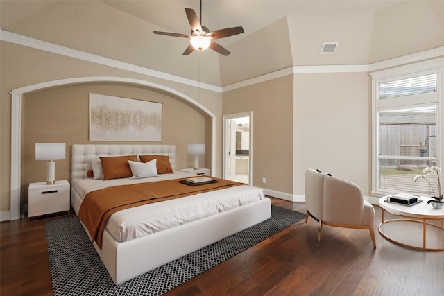 bedroom featuring dark hardwood / wood-style flooring, high vaulted ceiling, ceiling fan, and ensuite bathroom