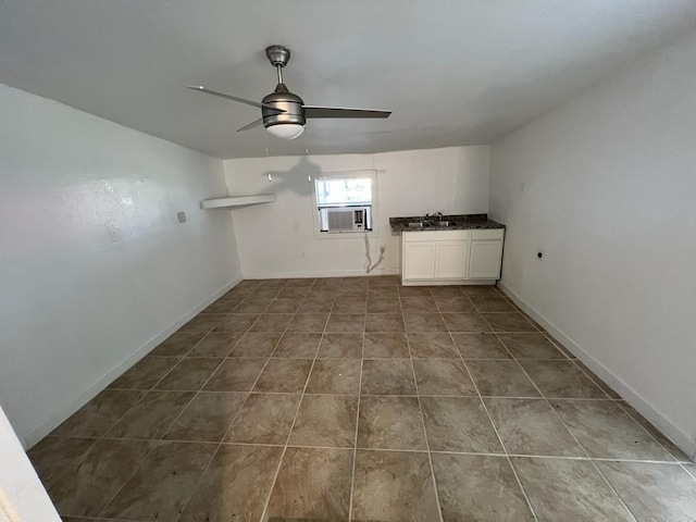 interior space featuring cooling unit and ceiling fan