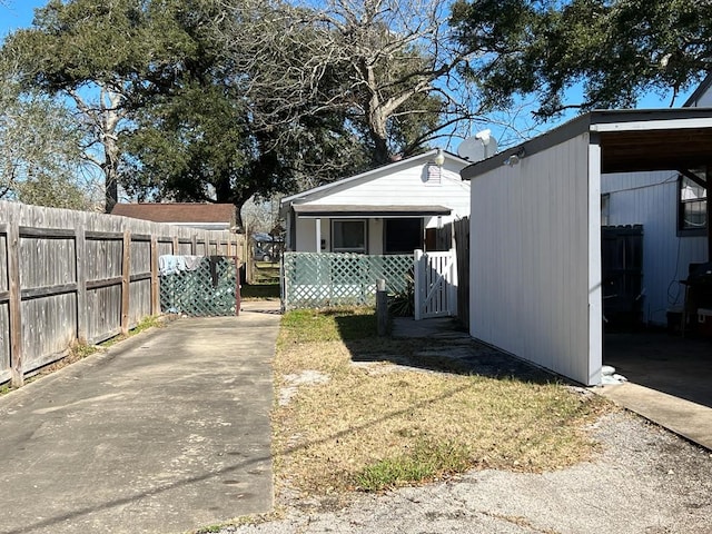 exterior space featuring a carport