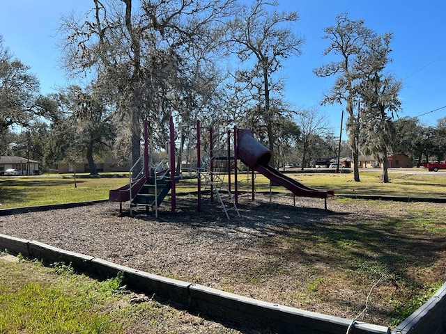 view of jungle gym featuring a yard