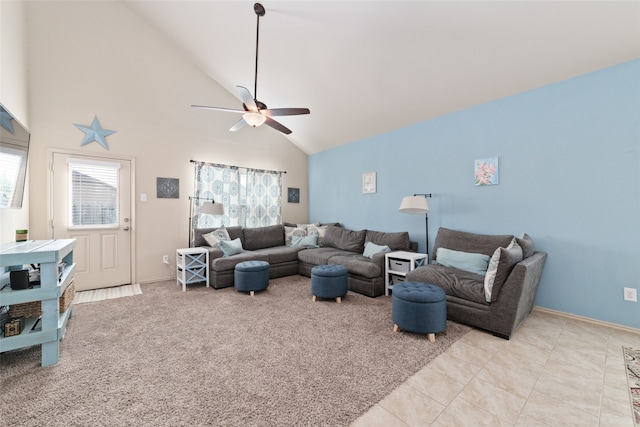 living room with light colored carpet, high vaulted ceiling, and ceiling fan